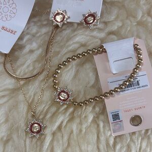 Gold and Red Ar razorbacks’ Jewelry Set.